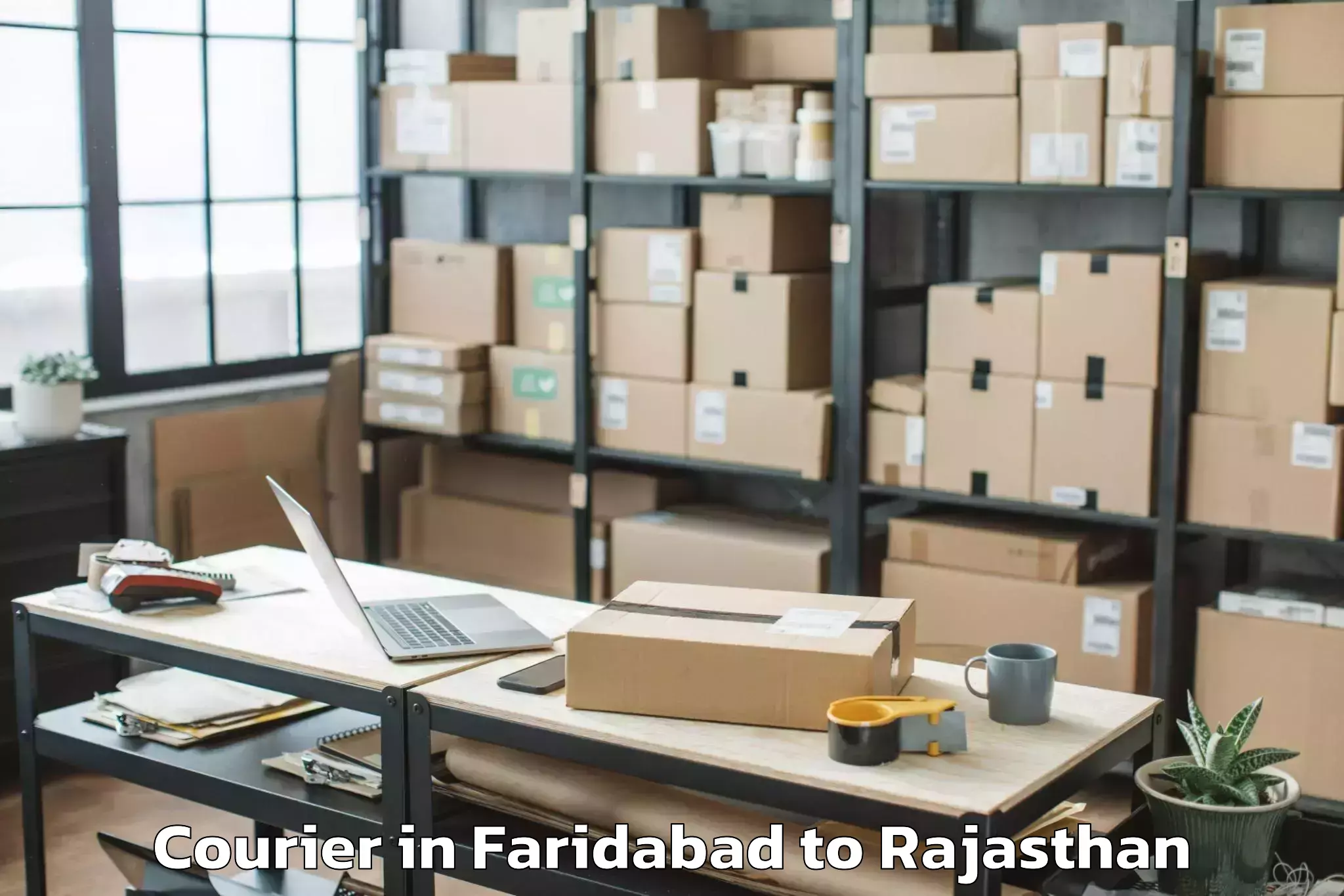 Book Faridabad to Phulera Courier